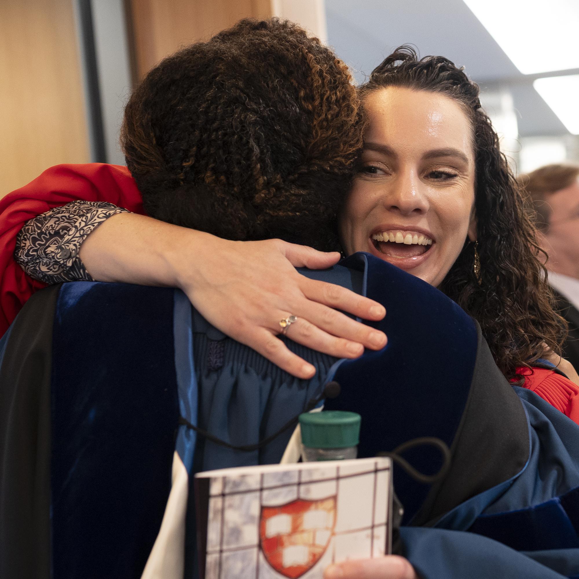 Gina Zurlo embraces Dean Frederick at Convocation reception