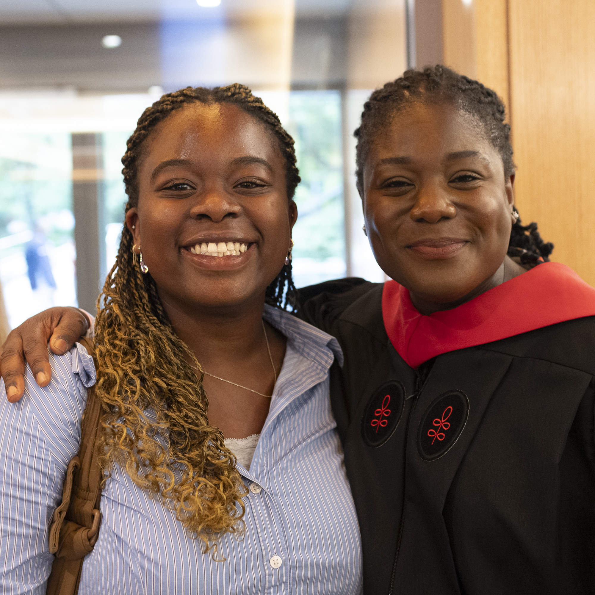 Two HDS community members pose for photo at Convocation reception