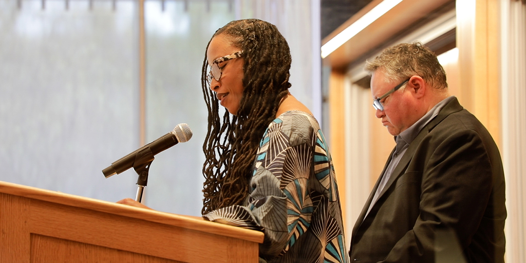 Melissa Wood Bartholomew and Steph Gauchel speak at a podium in the James Room