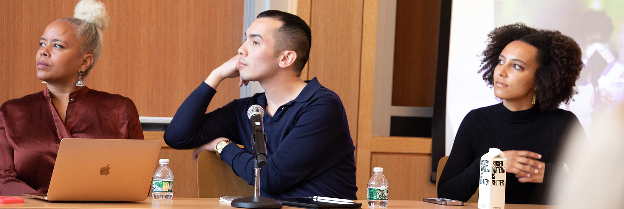 Three HDS students participating in an event panel at HDS