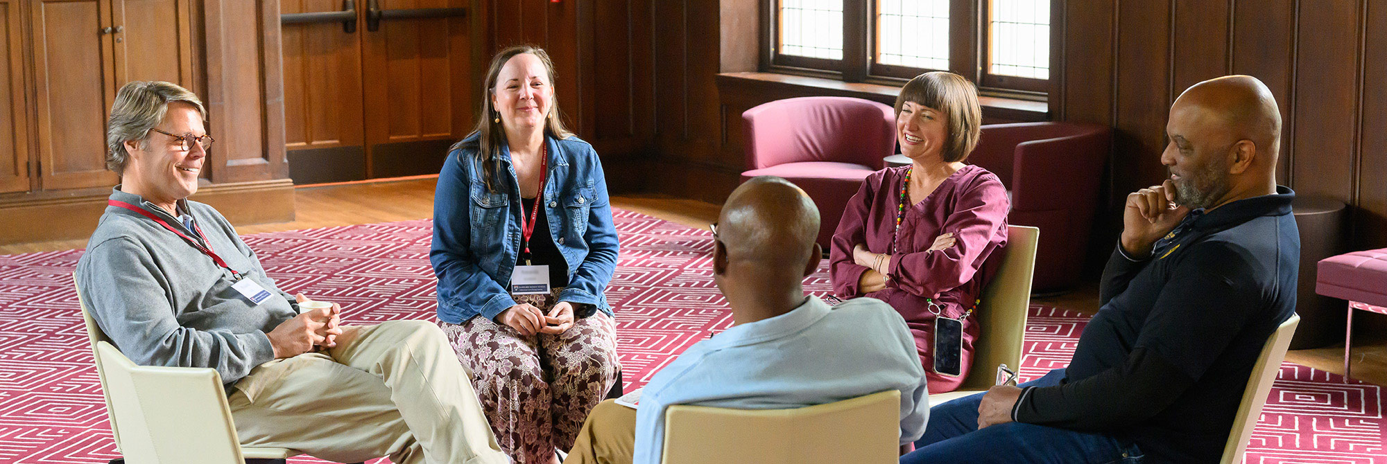 Small group of HDS students meeting in a classroom