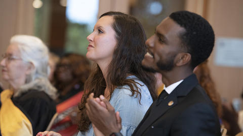 HDS students applauding at an event