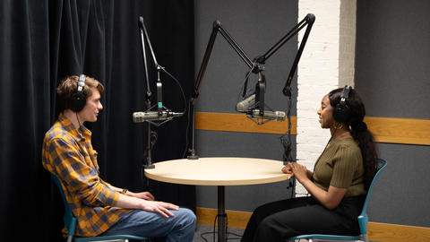 Two people in a recording studio
