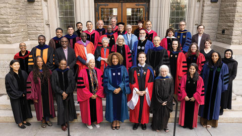 HDS faculty pose for photo in gowns at convocation
