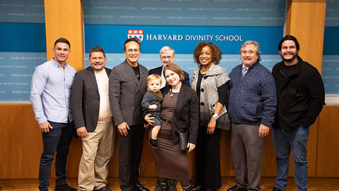 Mario Cader-Frech, third from left, is joined by his family and former Dean David N. Hempton and current Dean Marla F. Frederick. / Photo: Caroline Cataldo