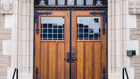 Wooden front doors to Swartz Hall