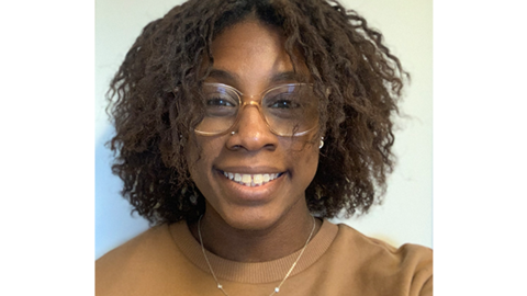 Image of Ebony West in a yellow shirt