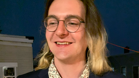 Justin Janesko smiles at the camera.