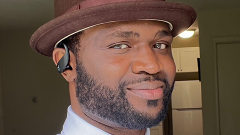 Kingsley Enaboakpe smiling at the camera