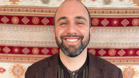 Munjed Murad smiling at the camera