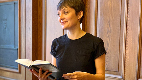 Rosemary Dodd holding a book
