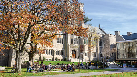 HDS Campus in the fall, with alumni on the campus green