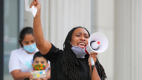 Rev. Bernadette Hickman-Maynard, Pastor at Bethel AME, speaks in front of the Essex County Superior Court