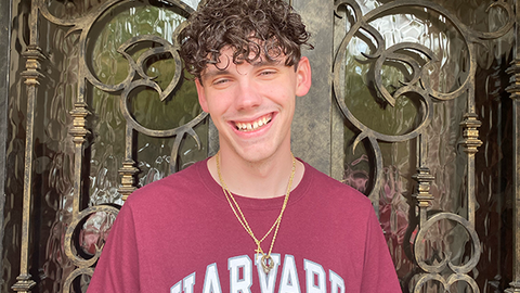 Cole Cloyd wearing a Harvard shirt