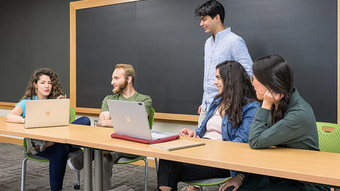 HDS students talking in a classroom