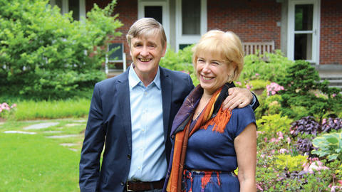 The Hemptons standing in a garden