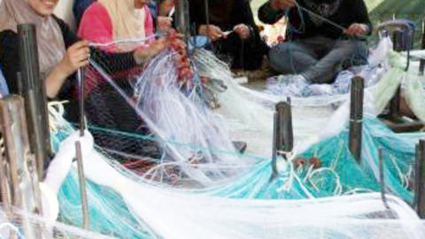 A group of women making nets in Northern Lebanon