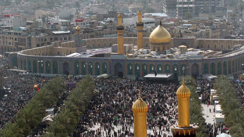 Millions of Shi'a Muslims gather around the shrine of Imam Hussain in Karbala, Iraq while undertaking pilgrimage on foot during Arba'een