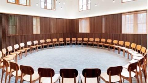 A circle of chairs in the Multifaith Space in Swartz Hall