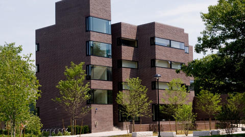 1960s Brutalist style three-story brick building