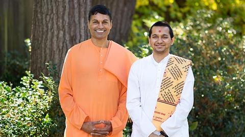 Swami Harinamananda and Sadhak Vandan in the courtyard of the Center for the Study of World Religions. / Photo: Justin Knight