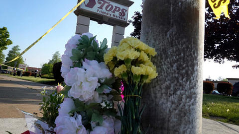 A bunch of flowers at a makeshift memorial outside the Tops supermarket in Buffalo, NY