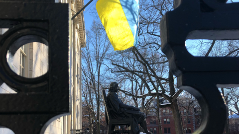 The flag of Ukraine flying in Harvard Yard.