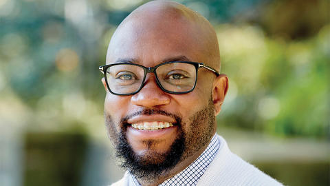 Willie Francois smiling at the camera