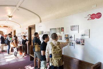 HDS Community viewing the exhibit in Andover Hall