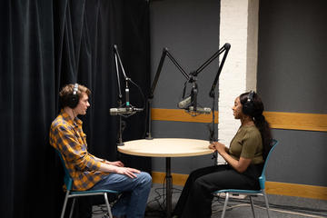 Two people in a recording studio