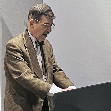 Jon Levenson speaking at a conference