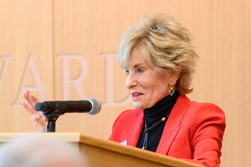 Arlene Hirschfeld speaking at lectern 