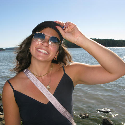 Julia Jackson posing before a body of water