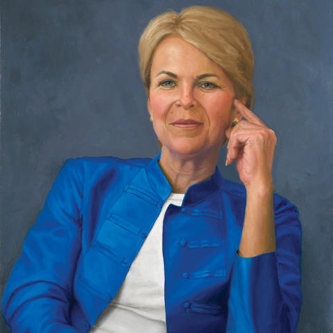 Connie Buchanan portrayed in blue jacket 
