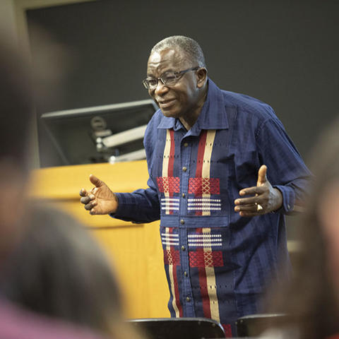 Jacob Olupona speaking before class