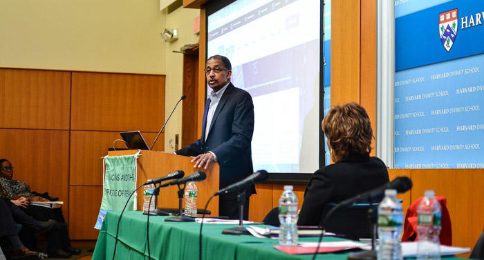 David J. Harris, managing director of the Charles Hamilton Houston Institute for Race and Justice, speaks in a lecture hall