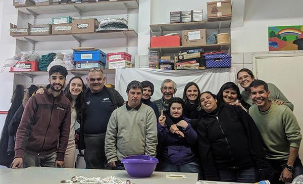 Salvador Peña with coworkers