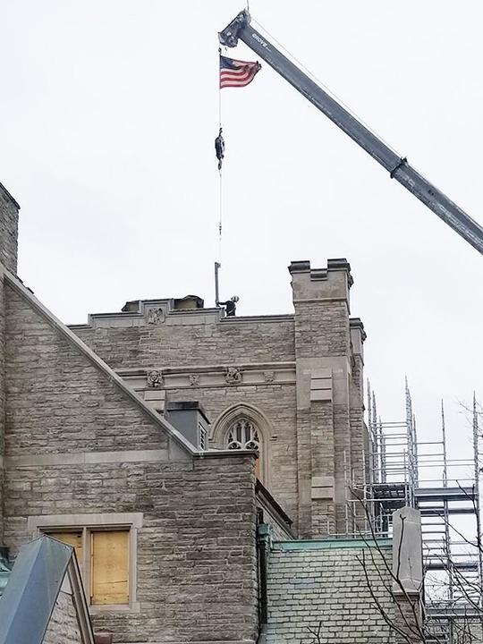 Crane lifting steel onto Swartz Hall