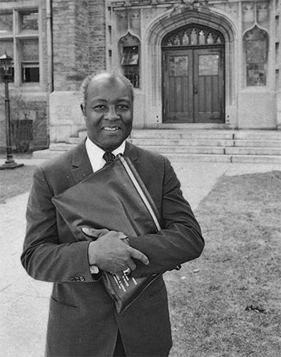 Preston Williams outside Swartz Hall (formerly known as Andover) when he started teaching at Harvard Divinity School in 1971. / HDS photo