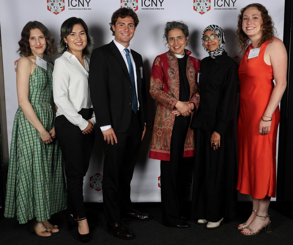 HDS student Dua Zahra stands with Interfaith Center of New York colleagues at an event
