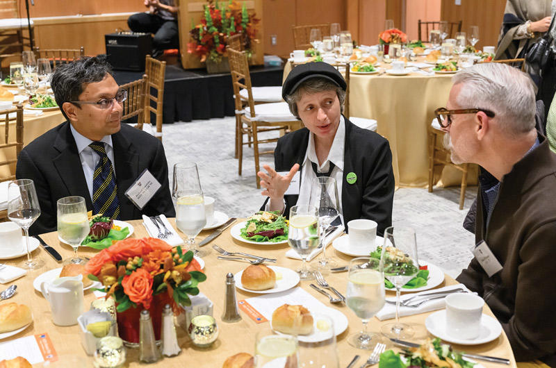Alumni chatting over lunch