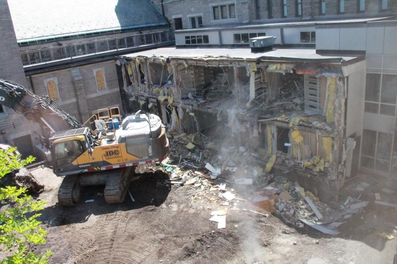 Cloister link being demolished