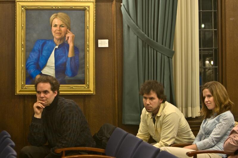 Students sitting in front of a portrait of Constance Buchanan