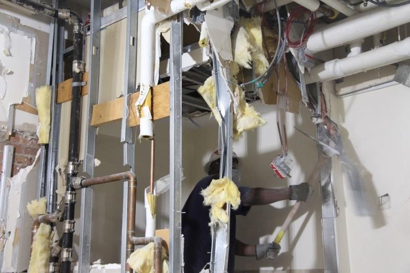 Demolishing wall frames in Swartz Hall