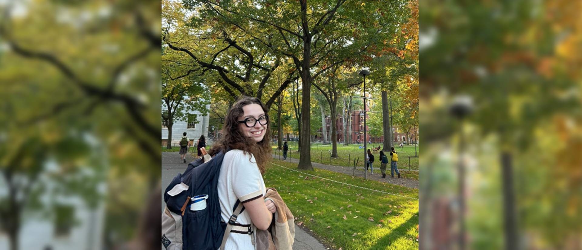 Lexi Kellehar stands in Harvard Yard wearing a backpack