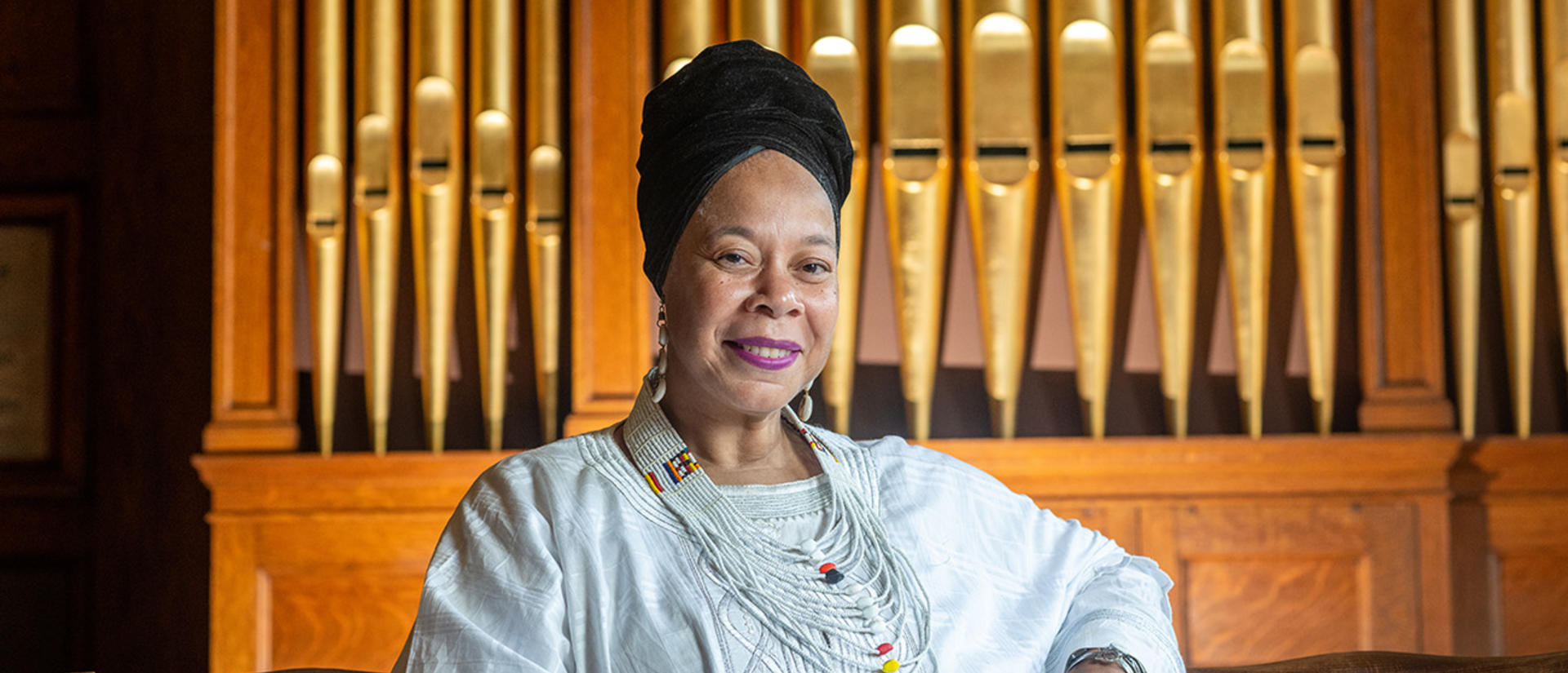 Tracey Hucks sitting in Divinity Chapel