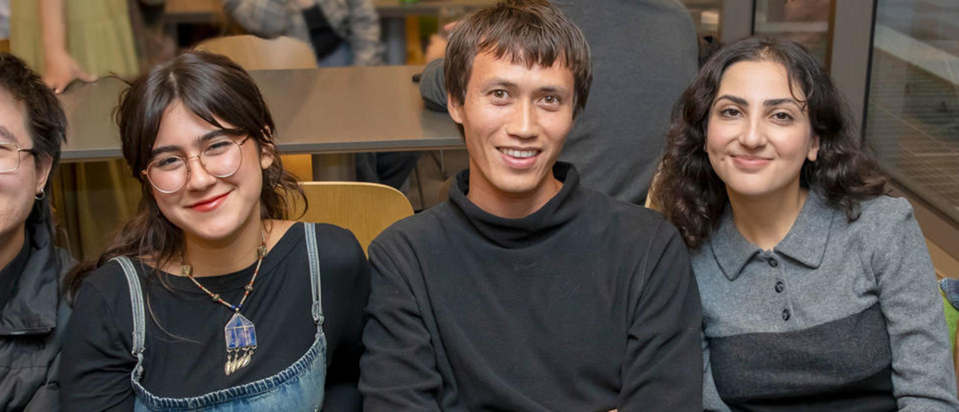 A group of 5 students smiling at the camera