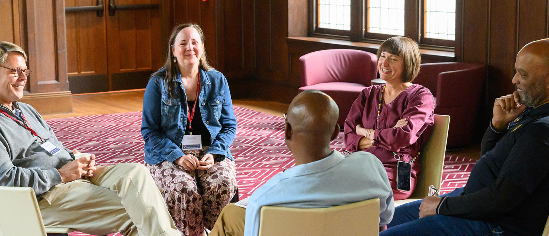 Small group of HDS students meeting in a classroom